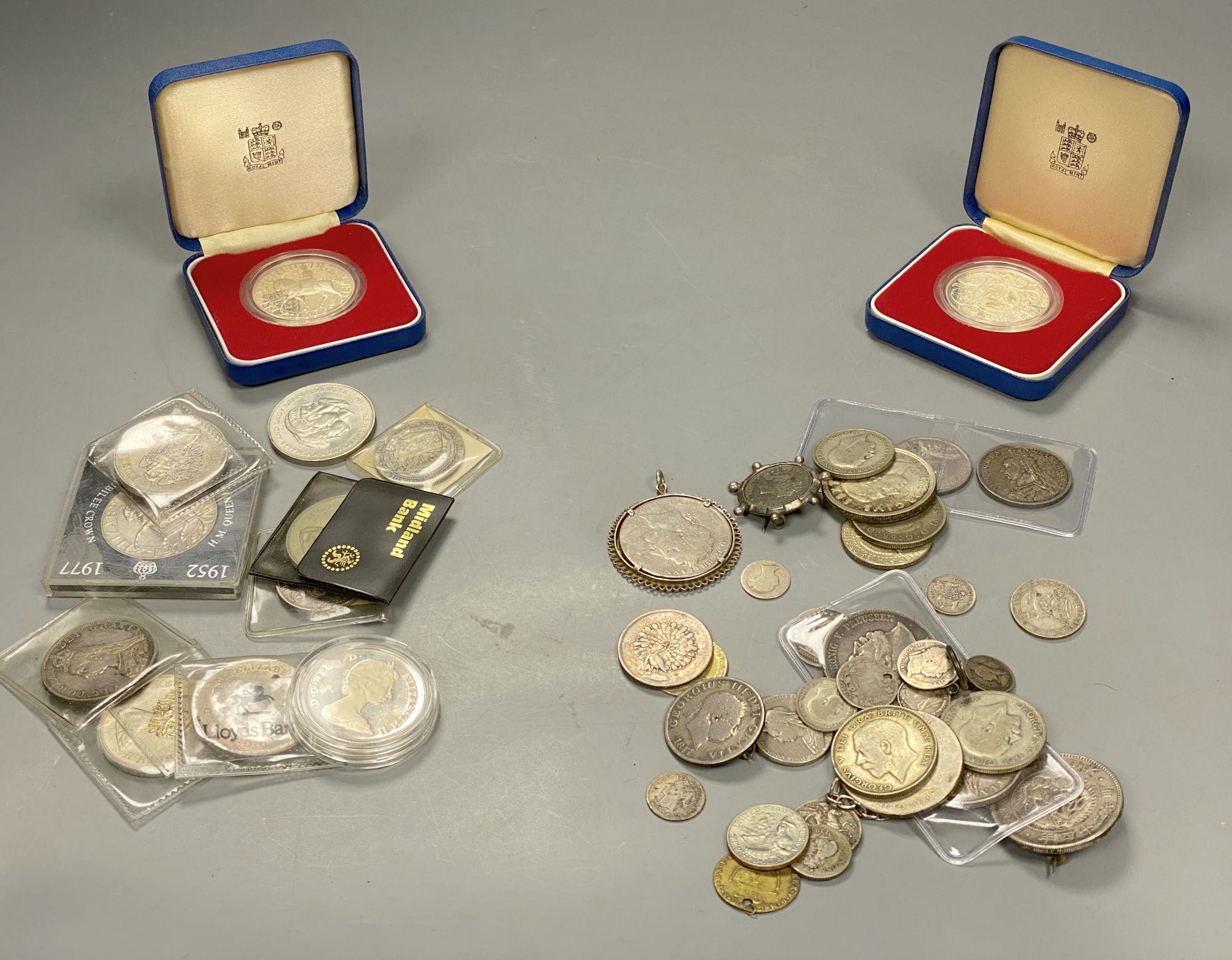 18th - 20th century World coins including 1887 half crown, 1876 five Marks, two cased 1977 silver crowns etc.